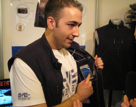 Zain from Ayegear showing us the iPhone pouch in his travel jacket